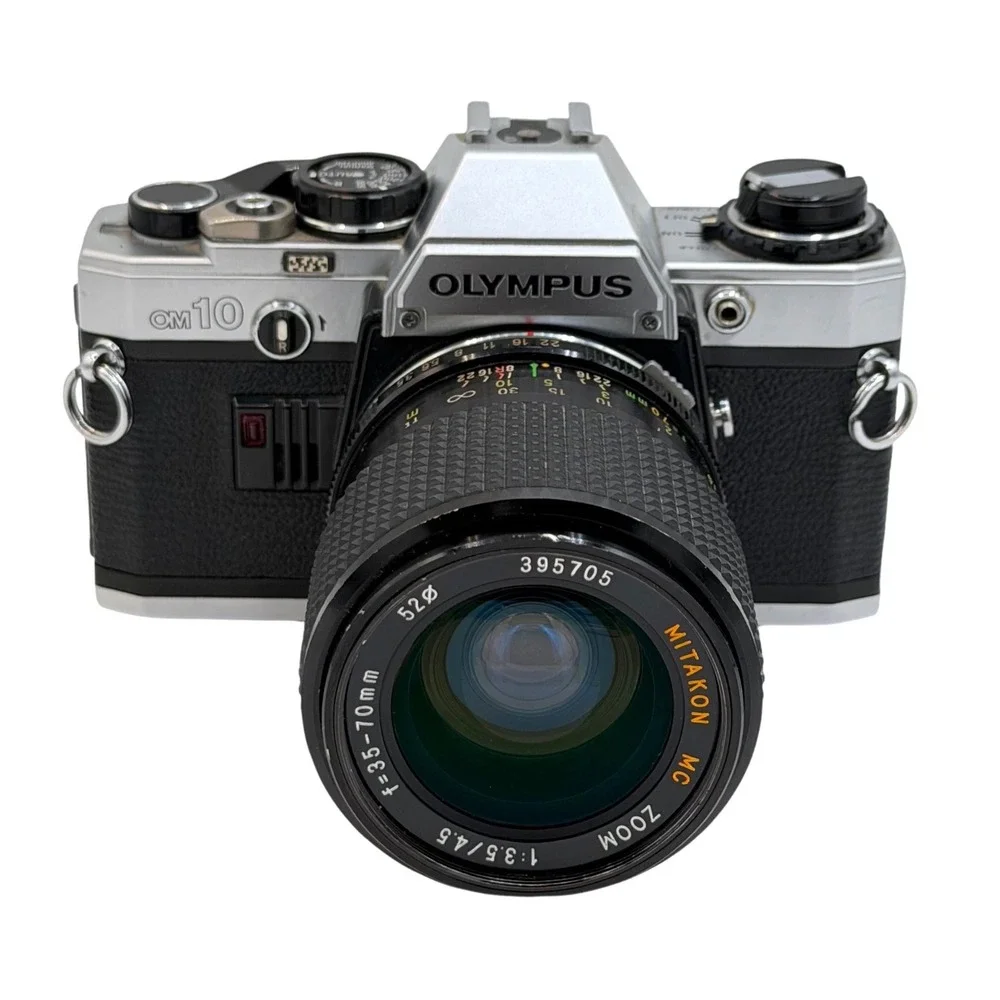 Olympus OM10 35mm Film SLR Camera Silver with Mitakon 35-70mm Zoom Lens Japan